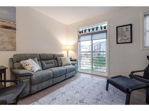 26 Walden Path Se, Calgary, AB - Indoor Photo Showing Living Room