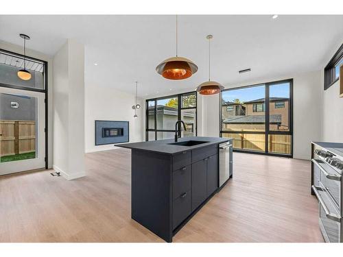 3A Willow Crescent Sw, Calgary, AB - Indoor Photo Showing Other Room With Fireplace