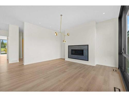 3A Willow Crescent Sw, Calgary, AB - Indoor Photo Showing Living Room With Fireplace