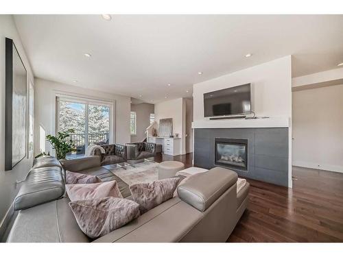 1804 47 Street Nw, Calgary, AB - Indoor Photo Showing Living Room With Fireplace