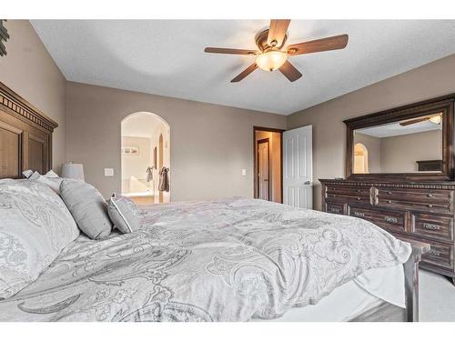 14 Drake Landing Crescent, Okotoks, AB - Indoor Photo Showing Bedroom