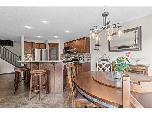 14 Drake Landing Crescent, Okotoks, AB - Indoor Photo Showing Dining Room