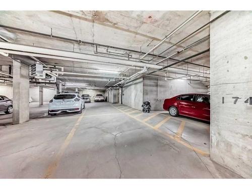 107-5115 Richard Road Sw, Calgary, AB - Indoor Photo Showing Garage