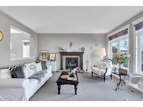 101 West Coach Place Sw, Calgary, AB - Indoor Photo Showing Living Room With Fireplace