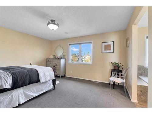 101 West Coach Place Sw, Calgary, AB - Indoor Photo Showing Bedroom