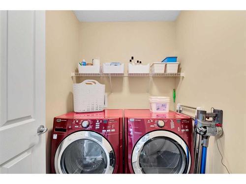 101 West Coach Place Sw, Calgary, AB - Indoor Photo Showing Laundry Room