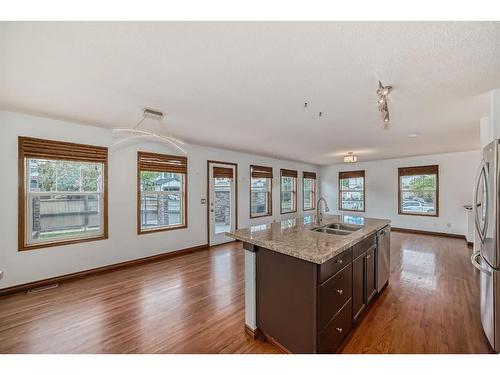 114 Bow Ridge Crescent, Cochrane, AB - Indoor Photo Showing Kitchen With Double Sink