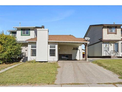 174 Pinemeadow Road Ne, Calgary, AB - Outdoor With Facade