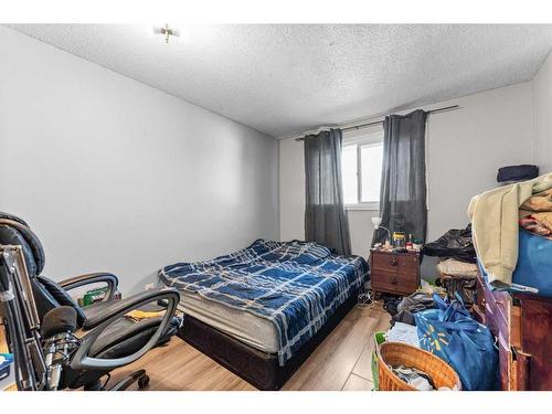 174 Pinemeadow Road Ne, Calgary, AB - Indoor Photo Showing Bedroom