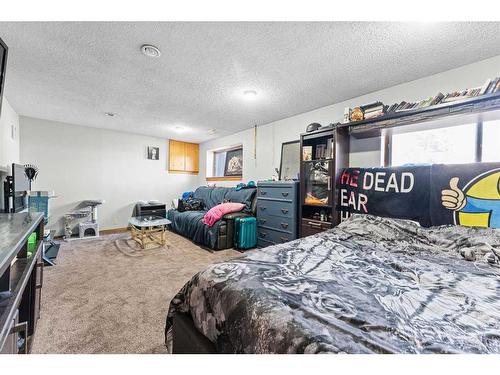 174 Pinemeadow Road Ne, Calgary, AB - Indoor Photo Showing Bedroom