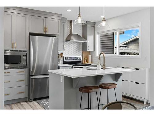 120 Howse Avenue Ne, Calgary, AB - Indoor Photo Showing Kitchen With Upgraded Kitchen