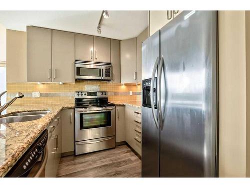 706-1410 1 Street Se, Calgary, AB - Indoor Photo Showing Kitchen With Stainless Steel Kitchen With Double Sink With Upgraded Kitchen