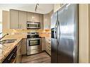 706-1410 1 Street Se, Calgary, AB  - Indoor Photo Showing Kitchen With Stainless Steel Kitchen With Double Sink With Upgraded Kitchen 