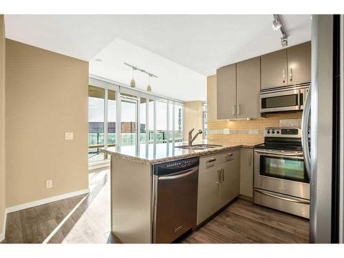 706-1410 1 Street Se, Calgary, AB - Indoor Photo Showing Kitchen With Stainless Steel Kitchen