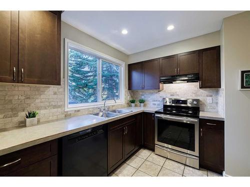 152 Whitlock Close Ne, Calgary, AB - Indoor Photo Showing Kitchen With Double Sink