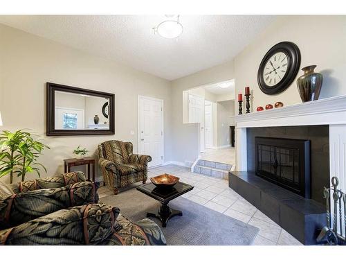 152 Whitlock Close Ne, Calgary, AB - Indoor Photo Showing Living Room With Fireplace