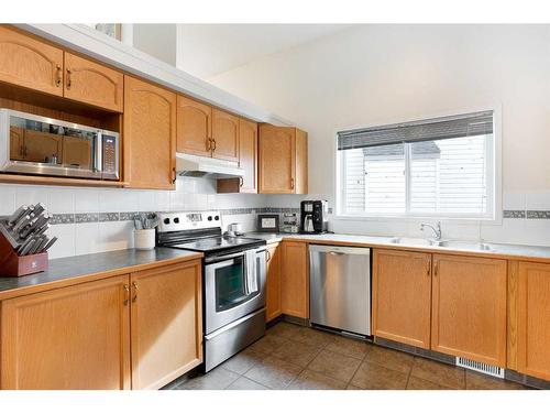 38 Coville Square Ne, Calgary, AB - Indoor Photo Showing Kitchen