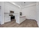 2105-60 Skyview Ranch Road Ne, Calgary, AB  - Indoor Photo Showing Kitchen With Stainless Steel Kitchen 