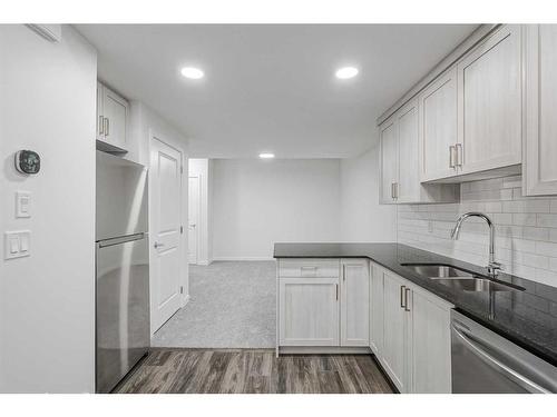 17 Creekstone Place Sw, Calgary, AB - Indoor Photo Showing Kitchen With Double Sink