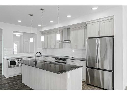 17 Creekstone Place Sw, Calgary, AB - Indoor Photo Showing Kitchen With Stainless Steel Kitchen With Upgraded Kitchen