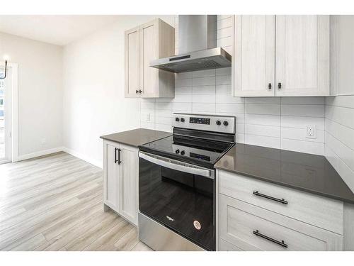 86 Belmont Passage Sw, Calgary, AB - Indoor Photo Showing Kitchen