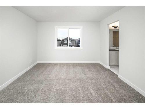 86 Belmont Passage Sw, Calgary, AB - Indoor Photo Showing Other Room