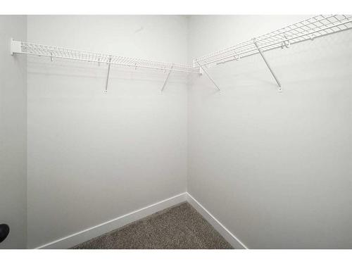 86 Belmont Passage Sw, Calgary, AB - Indoor With Storage