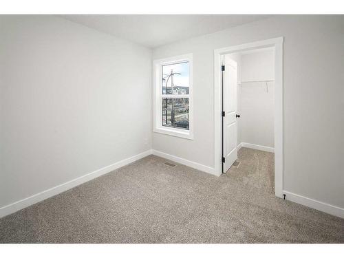 86 Belmont Passage Sw, Calgary, AB - Indoor Photo Showing Other Room