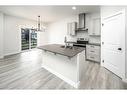 86 Belmont Passage Sw, Calgary, AB  - Indoor Photo Showing Kitchen With Double Sink With Upgraded Kitchen 