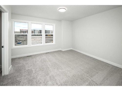 86 Belmont Passage Sw, Calgary, AB - Indoor Photo Showing Other Room