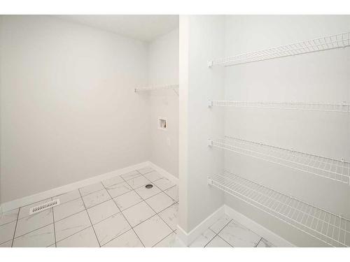 86 Belmont Passage Sw, Calgary, AB - Indoor With Storage