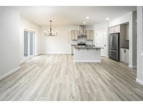 86 Belmont Passage Sw, Calgary, AB - Indoor Photo Showing Kitchen With Stainless Steel Kitchen