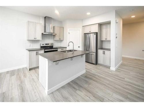 86 Belmont Passage Sw, Calgary, AB - Indoor Photo Showing Kitchen With Stainless Steel Kitchen With Upgraded Kitchen