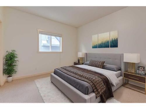 27 Kingsland Way Se, Airdrie, AB - Indoor Photo Showing Bedroom