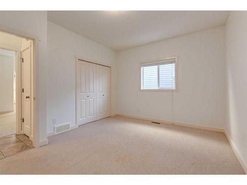 27 Kingsland Way Se, Airdrie, AB - Indoor Photo Showing Other Room