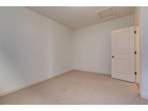 27 Kingsland Way Se, Airdrie, AB - Indoor Photo Showing Other Room