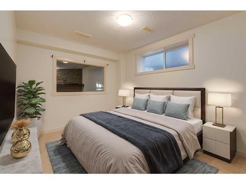 27 Kingsland Way Se, Airdrie, AB - Indoor Photo Showing Bedroom