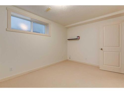 27 Kingsland Way Se, Airdrie, AB - Indoor Photo Showing Other Room