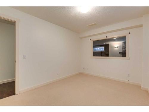 27 Kingsland Way Se, Airdrie, AB - Indoor Photo Showing Other Room