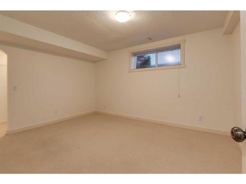 27 Kingsland Way Se, Airdrie, AB - Indoor Photo Showing Other Room