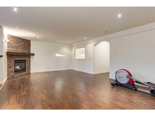 27 Kingsland Way Se, Airdrie, AB - Indoor With Fireplace