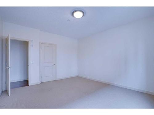 209-910 18 Avenue Sw, Calgary, AB - Indoor Photo Showing Other Room