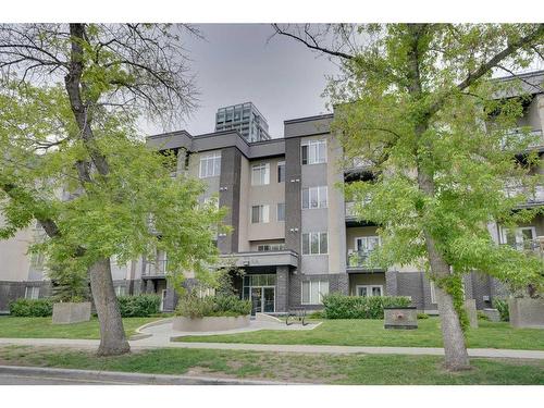 209-910 18 Avenue Sw, Calgary, AB - Outdoor With Facade