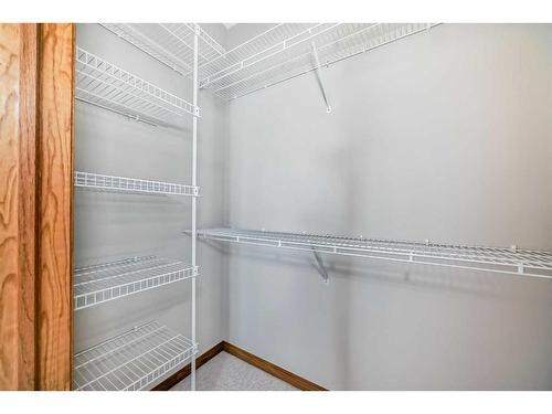 521 Cimarron Point, Okotoks, AB - Indoor With Storage