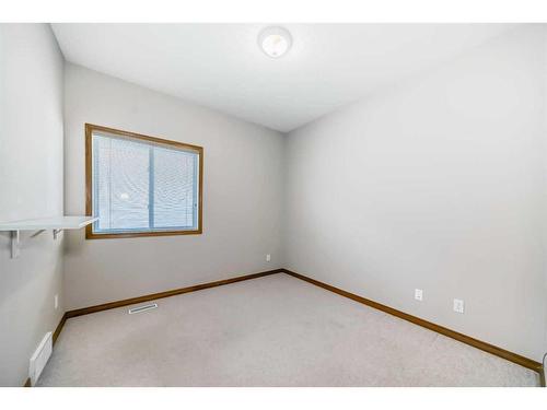 521 Cimarron Point, Okotoks, AB - Indoor Photo Showing Other Room