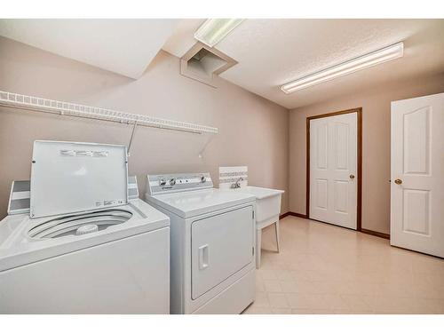 521 Cimarron Point, Okotoks, AB - Indoor Photo Showing Laundry Room