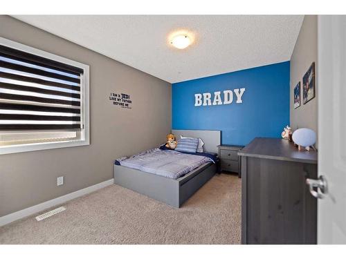 15 Walden Place Se, Calgary, AB - Indoor Photo Showing Bedroom