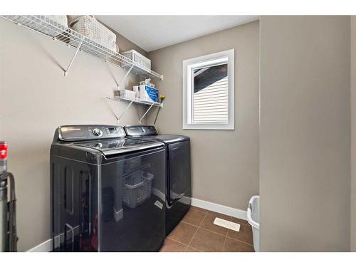 15 Walden Place Se, Calgary, AB - Indoor Photo Showing Laundry Room