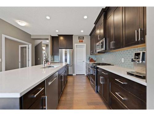 15 Walden Place Se, Calgary, AB - Indoor Photo Showing Kitchen With Upgraded Kitchen