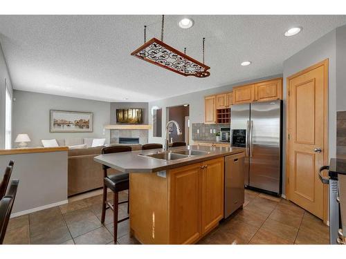 230 New Brighton Circle Se, Calgary, AB - Indoor Photo Showing Kitchen With Stainless Steel Kitchen With Double Sink